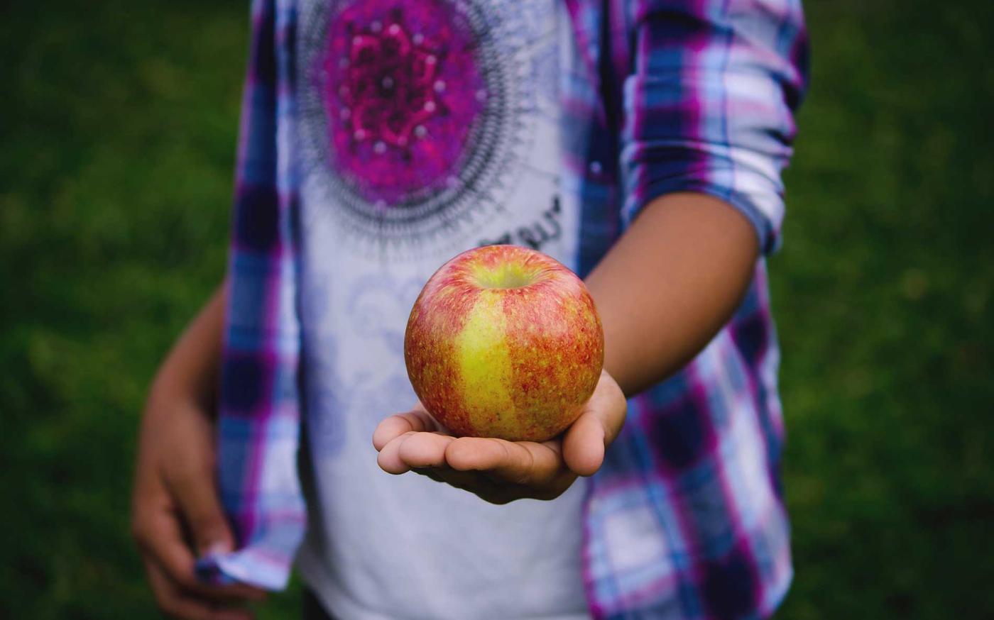 Child with apple.